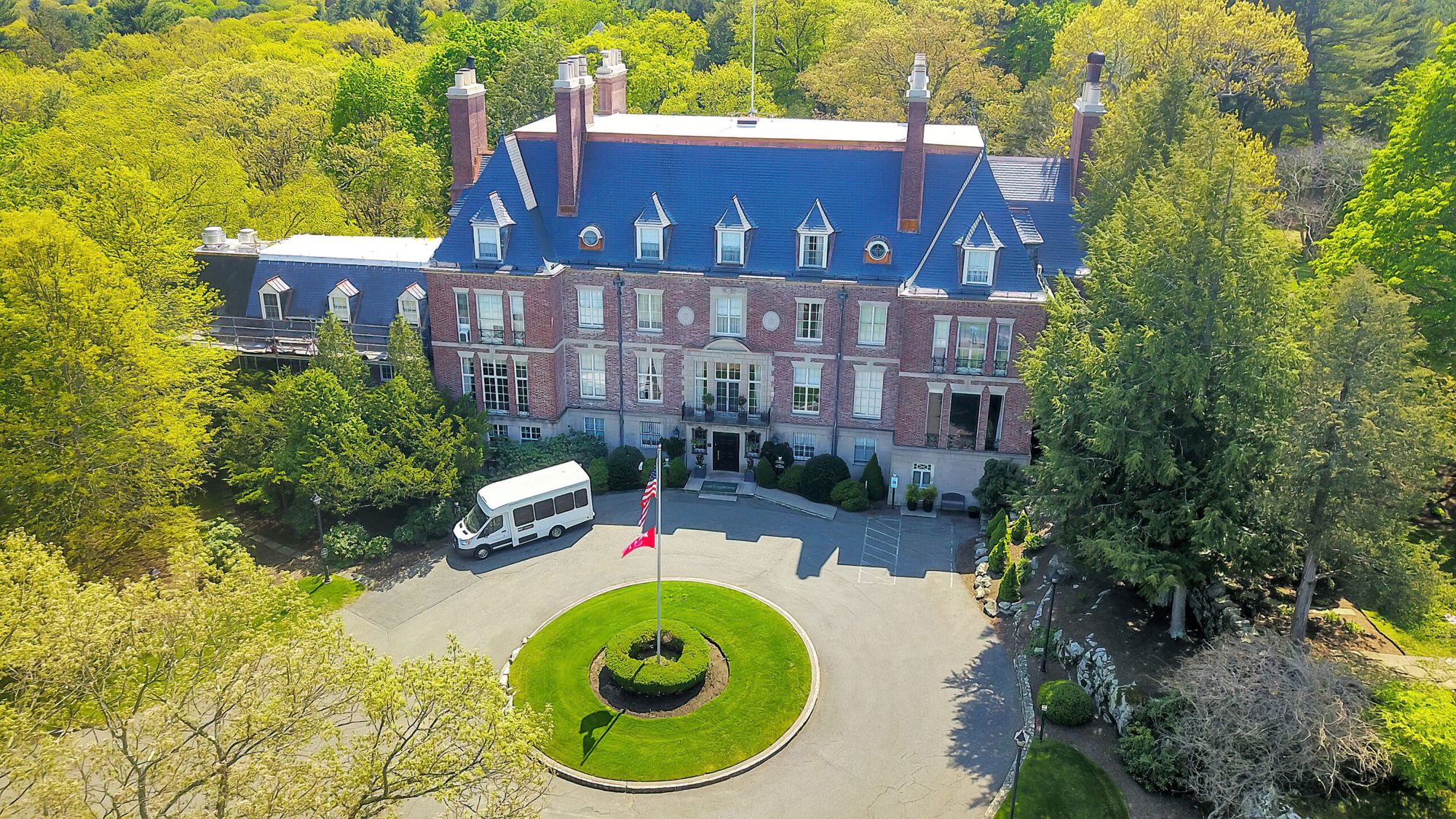 Aerial view of the French manor mansion among the trees