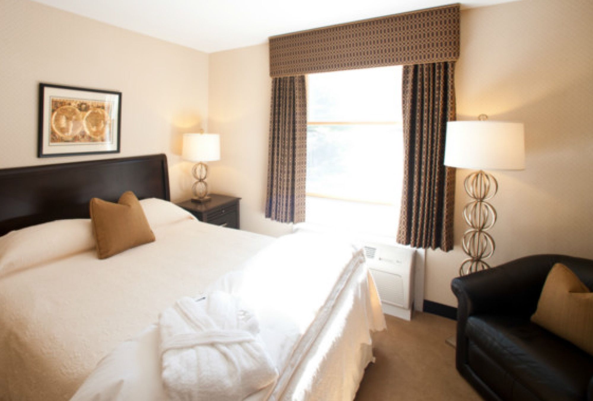 Contemporary Brooks Center guest room with king bed
